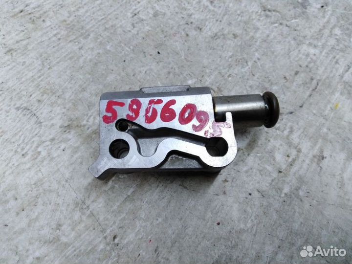 Натяжитель цепи грм