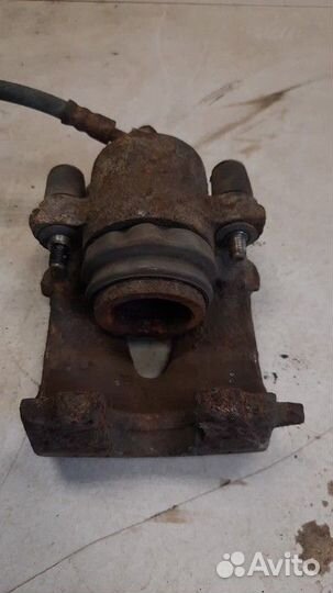 Суппорт тормозной передний левый Audi A3