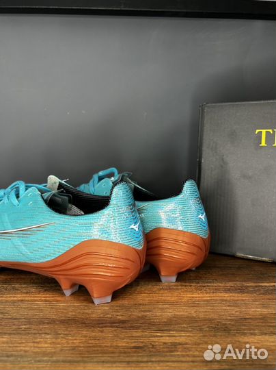 Бутсы mizuno alpha