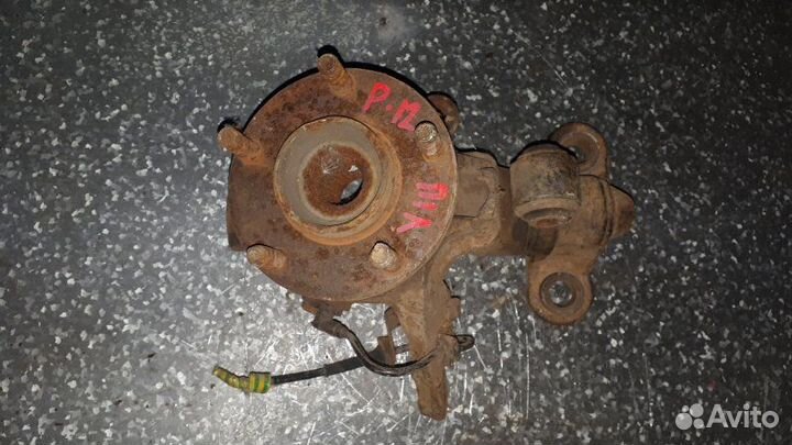 Кулак поворотный передний левый Nissan Primera P12