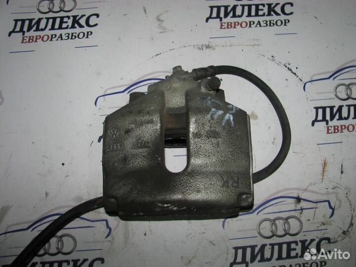 Суппорт передний левый VW Passat (B6) 2005-2010