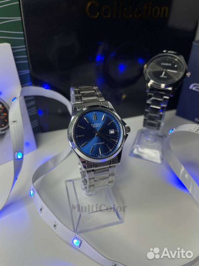 Часы Casio серебристые Новые