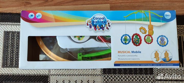 Музыкальная карусель на кроватку