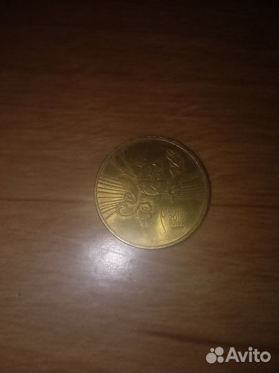 Монета олимпийская юбилейная