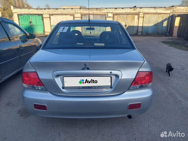 Mitsubishi Lancer 1.6 МТ, 2006, 219 500 км