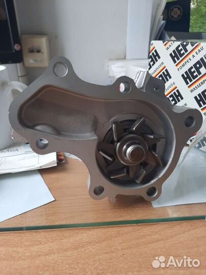 Помпа mitsubishi гольф лансер.дв.1.3,1.6 16кл