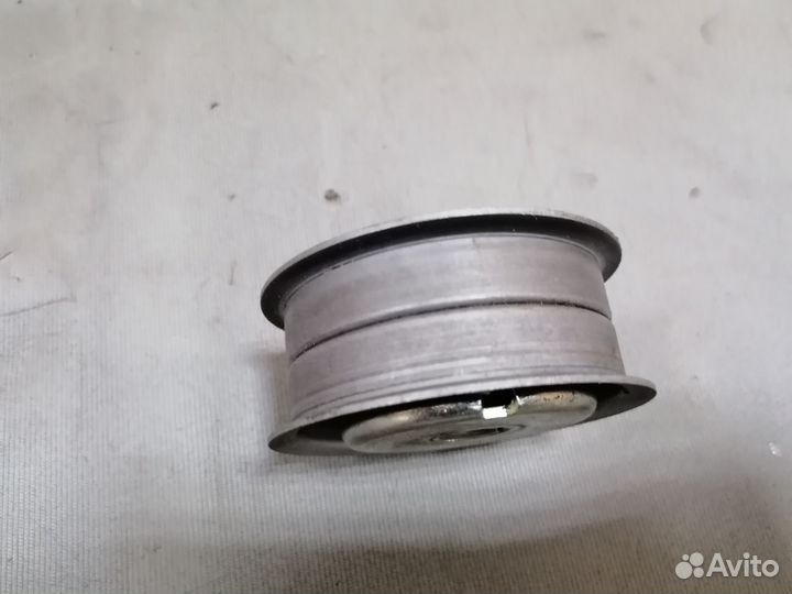 Ролик грм натяжной 051 109 243А VW Passat B5 1990