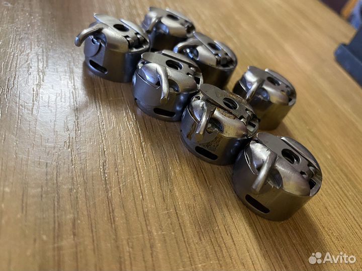 Шпульный колпачок