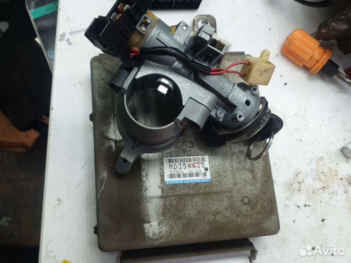 Эбу Mitsubishi MD354635 Лансер 7