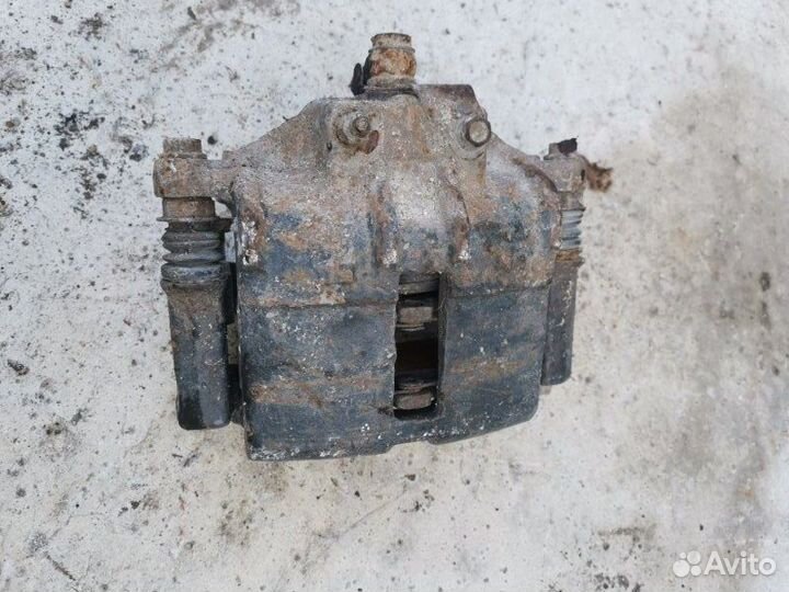 Суппорт тормозной передний левый Газ 31105 седан