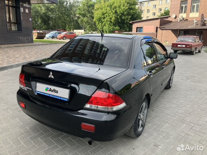Mitsubishi Lancer 1.6 МТ, 2005, 180 000 км