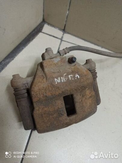 Передний суппорт левый Nissan Almera N16 2002-2006