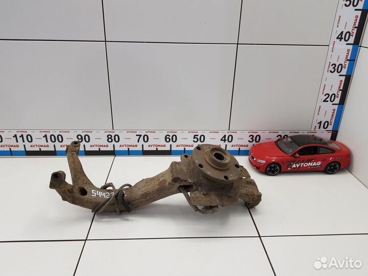 Кулак поворотный передний левый