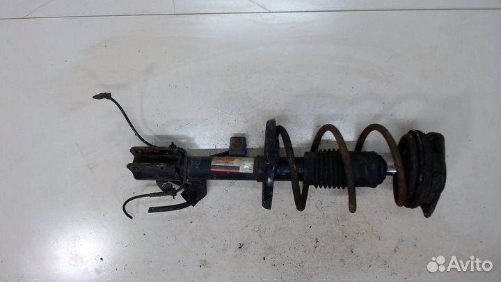 Амортизатор подвески Nissan Note E11, 2012