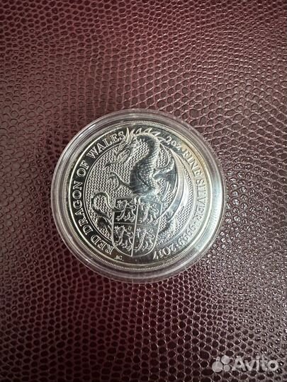 Серебряные монеты звери Королевы