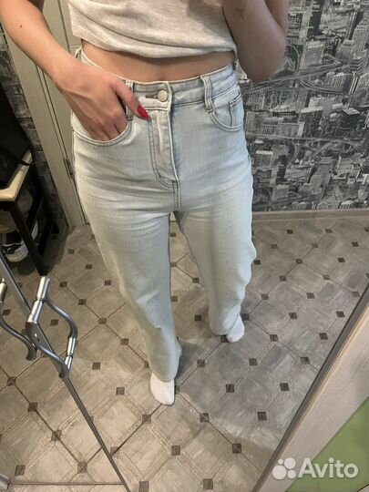 Джинсы голубые