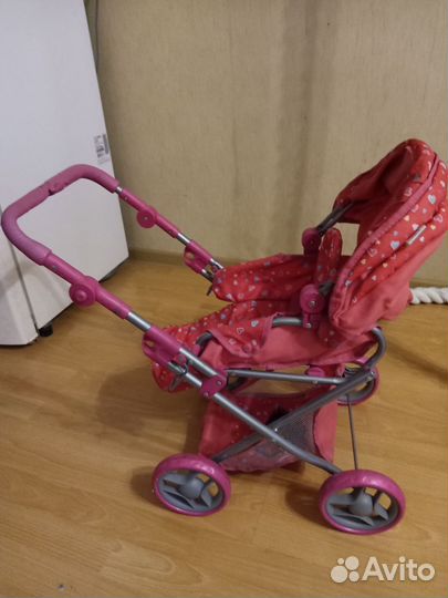 Игрушечная коляска для кукол