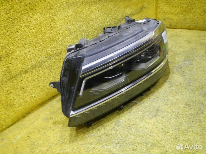 Фара левая Volkswagen Tiguan