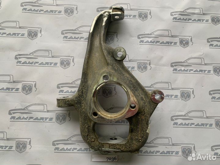 Кулак поворотный левый