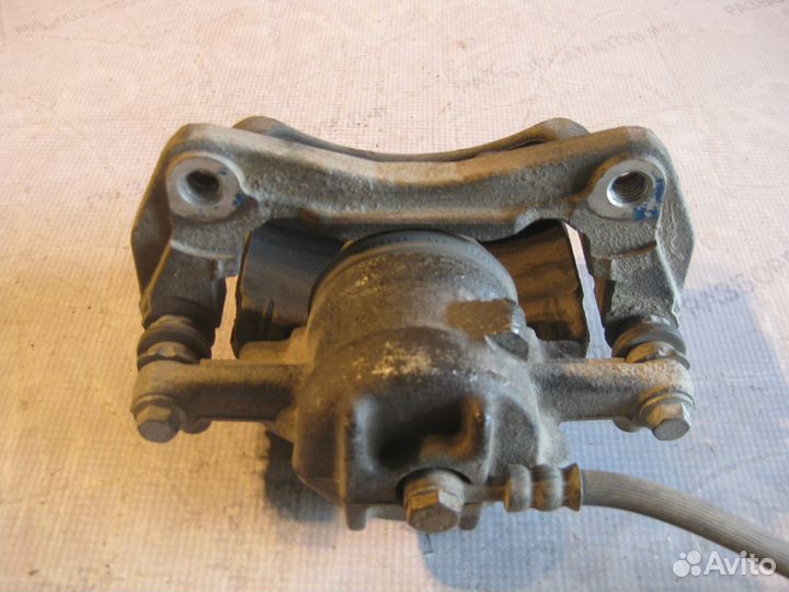 Суппорты тормозные передние Мицубиши Кольт 6