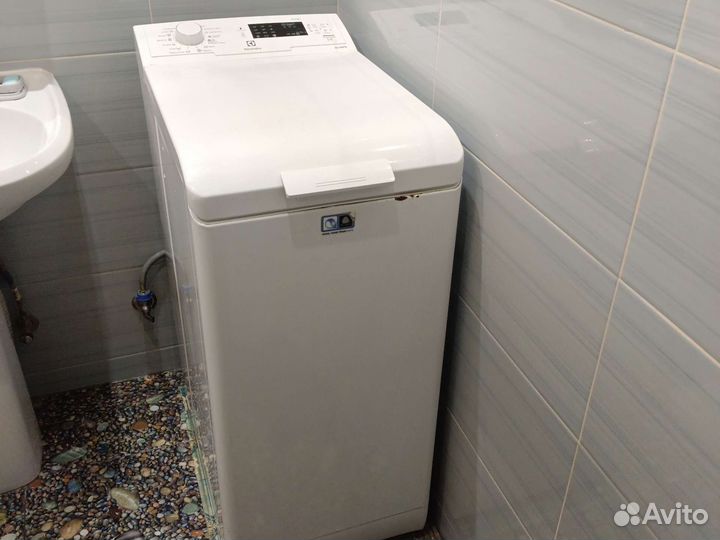 Стиральная машина с вертикальной загрузкой