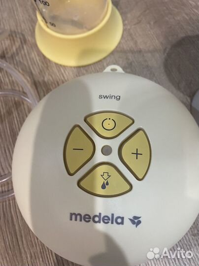 Молокоотсос medela электрический
