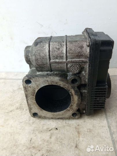 Дроссельная заслонка Nissan Almera N16 sera75601