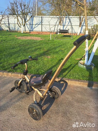 Трехколесный велосипед с ручкой