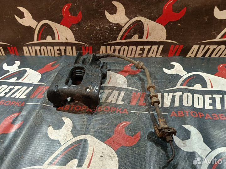 Суппорт тормозной передний левый Ford Focus 1 MK1