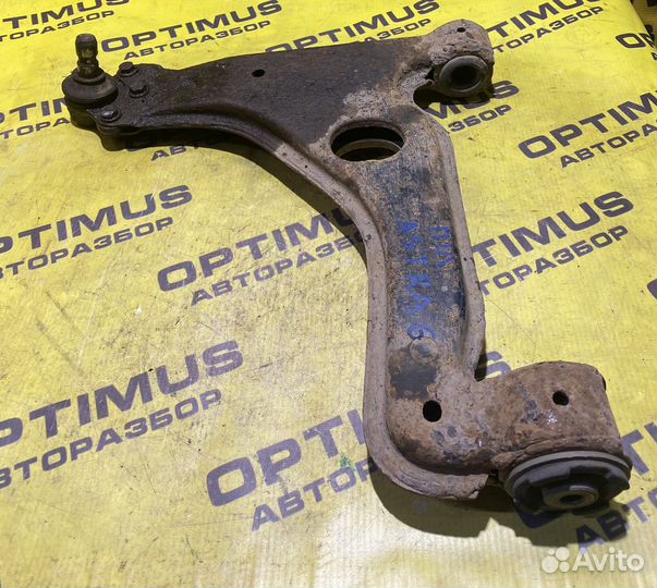 Передний левый рычаг Opel Astra G