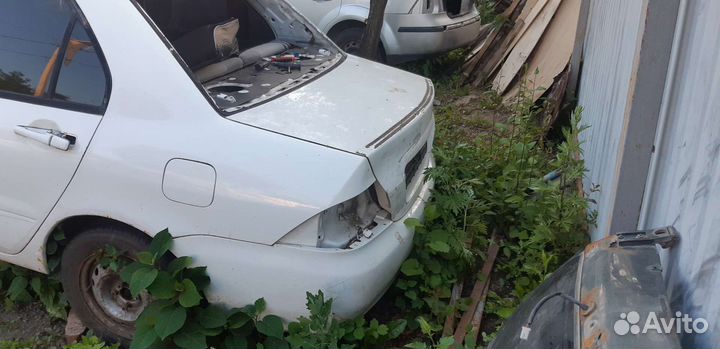 Крышка багажника mitsubishi lancer 9