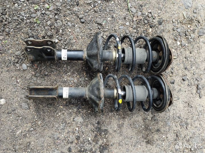 Стойки передние Митсубиси Лансер 9