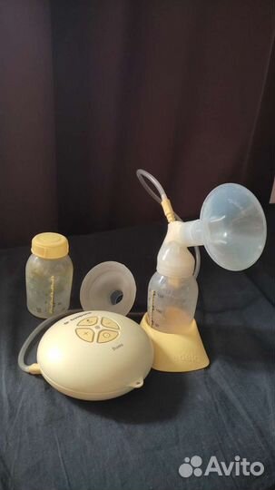 Молокоотсос medela swing электрический