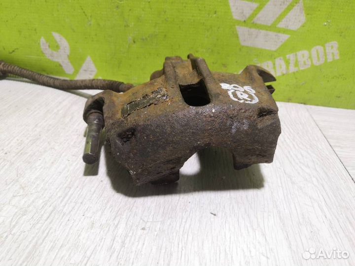 Суппорт передний правый Пежо 206