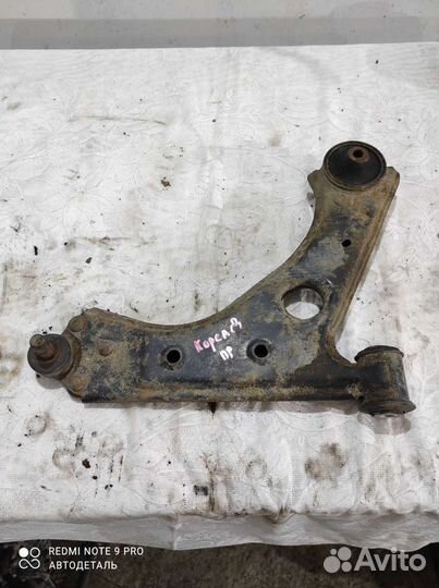 Передний правый рычаг Opel corsa d