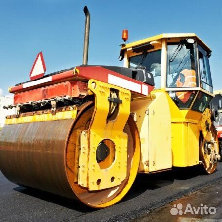 Машинист катка