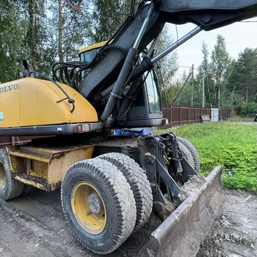 Колёсный экскаватор Volvo EW140, 2000