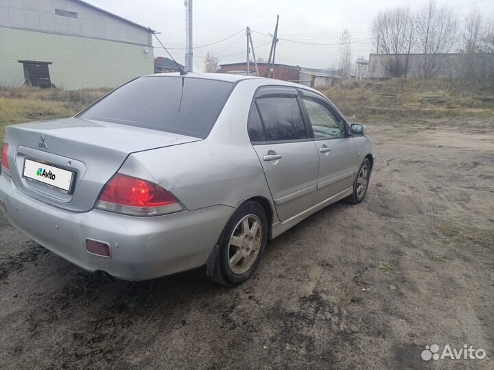 Mitsubishi Lancer 1.6 МТ, 2006, 258 000 км