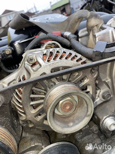 Генератор EZ30D Subaru Legacy BLE 23700AA510