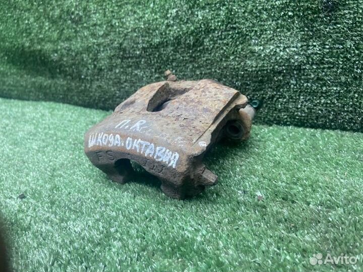 Суппорт тормозной передний правый Skoda Octavia 1