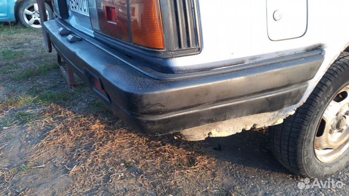 Бампер задний ниссан санни b11