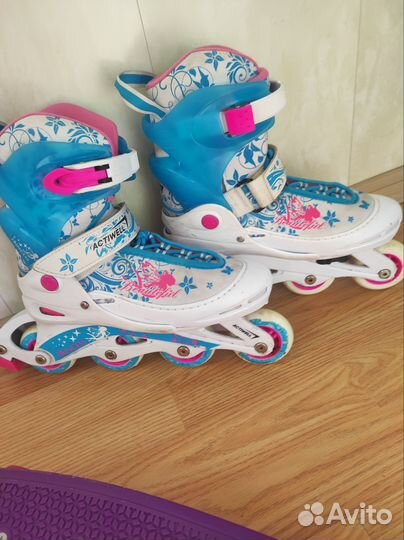 Роликовые коньки