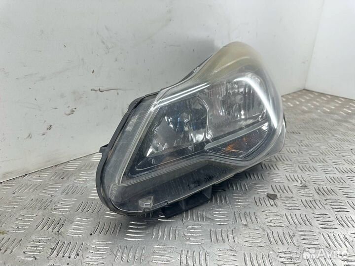 Фара левая Opel Corsa D 2-й рест. 2012 90020227