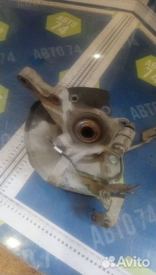 Кулак поворотный передний левый Mitsubishi Lance