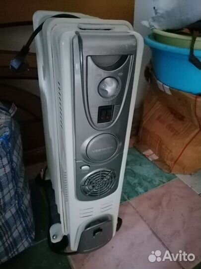 Масляный обогреватель