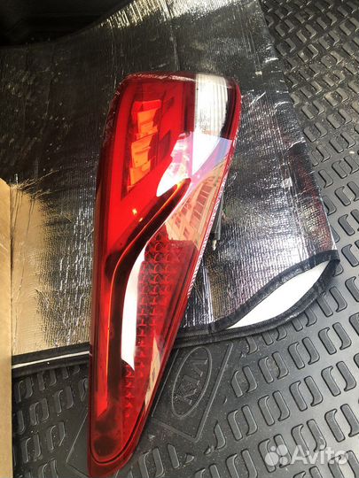 Фара задняя внешняя левая Kio RIo 2021-н.д