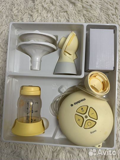 Молокоотсос medela электрический swing flex