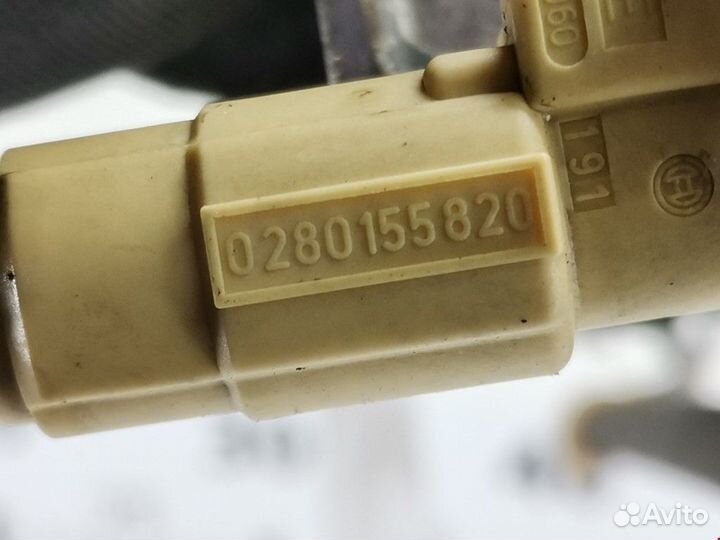 Форсунка Ford Focus рест. 2002 1111849