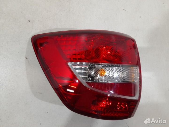 Фонарь левый LADA Granta седан 2011