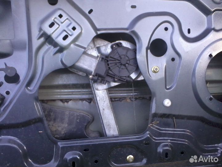 Электростеклоподъемник вод. двери Рено Логан